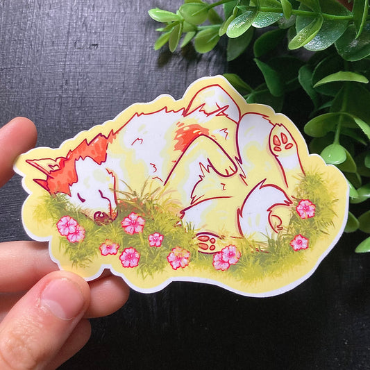 Dog Laying in Flowers Sticker